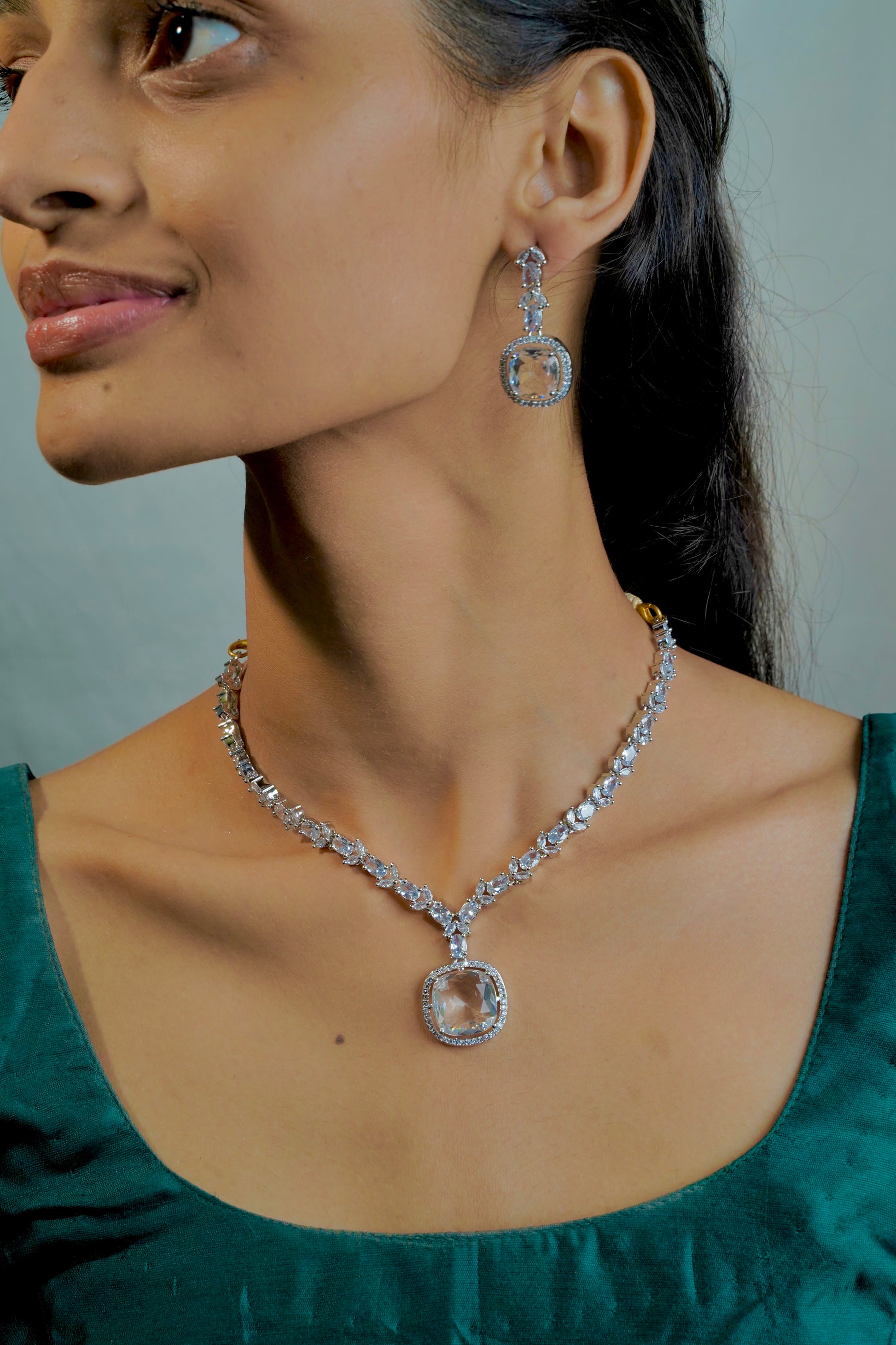 "Elegant AD Necklace with Bold Pendant and Stunning Center Stone" - Jewels by Meena
