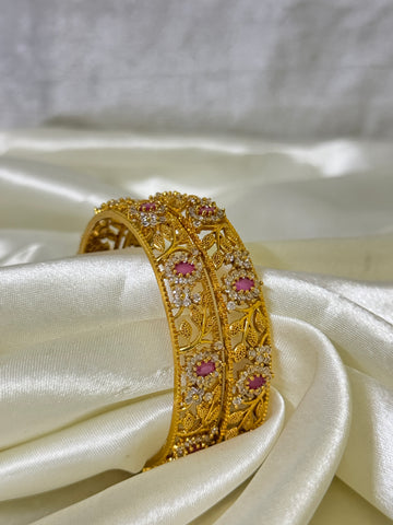 Radiant Elegance: Golden Bangles with Red Stones and Floral Design(size 2.6)