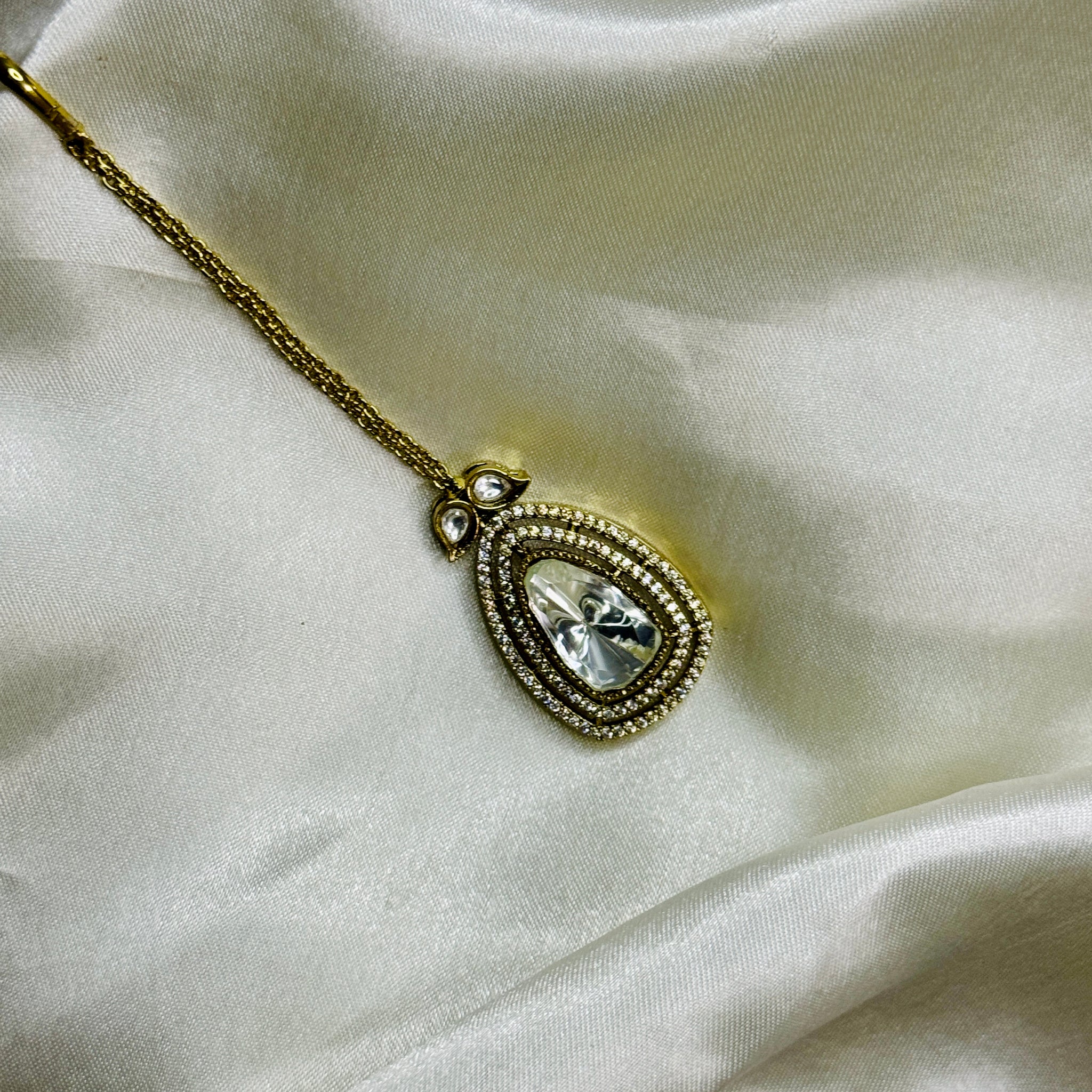 Floral Grace: Victorian Maangtikka with Crystal Flower Design