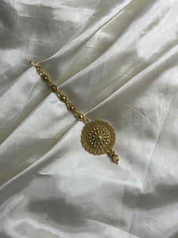 Golden Heritage: Antique Maangtikka with Unique Pattern and Golden Beads