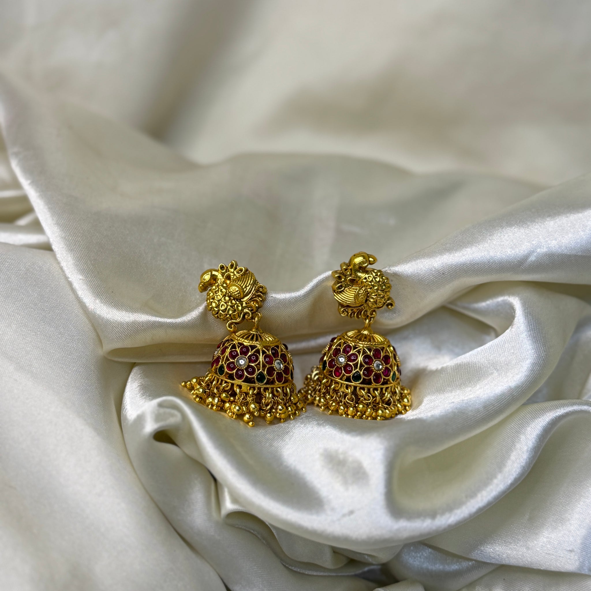 Majestic Peacock & Floral Antique Jhumka Earrings with Stone Accents