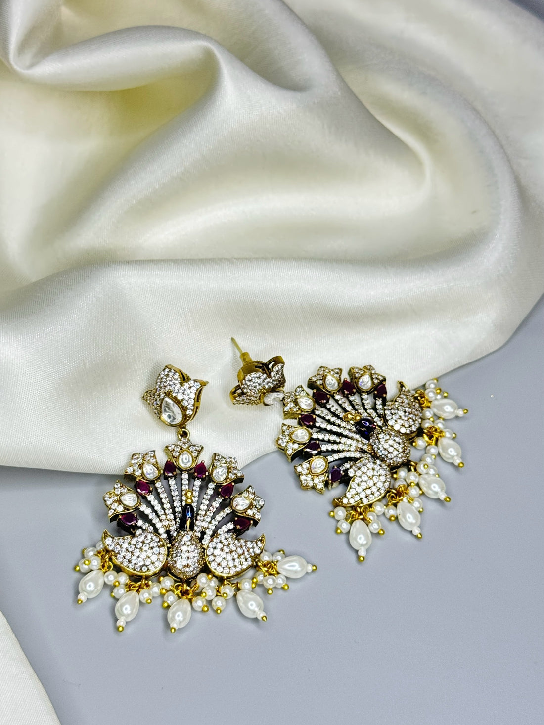 Colorful Peacock Design AD Earrings with White Beads & Stone Accents" - Jewels by Meena