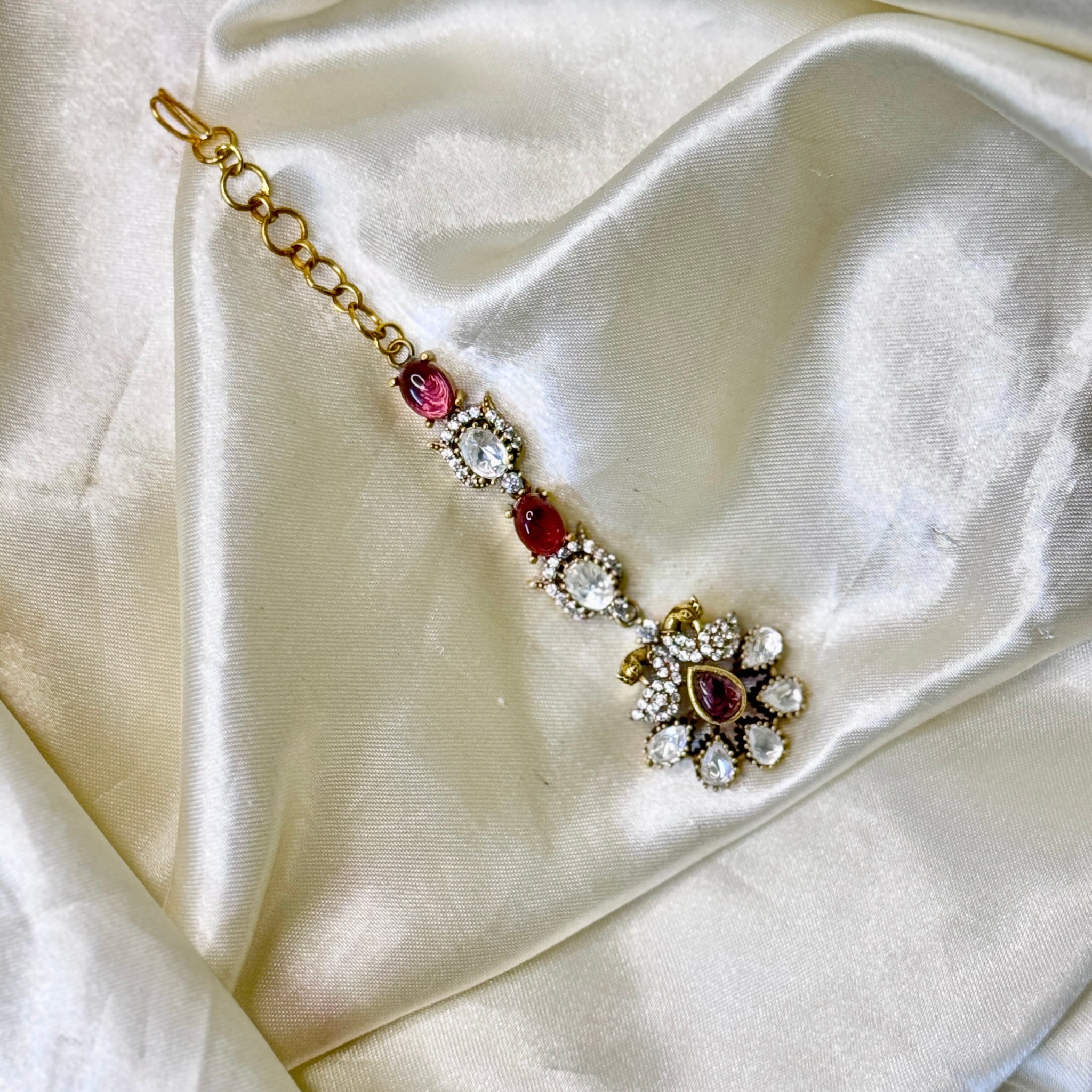 Regal Peacock Maangtikka with Red Stones & Floral Accents