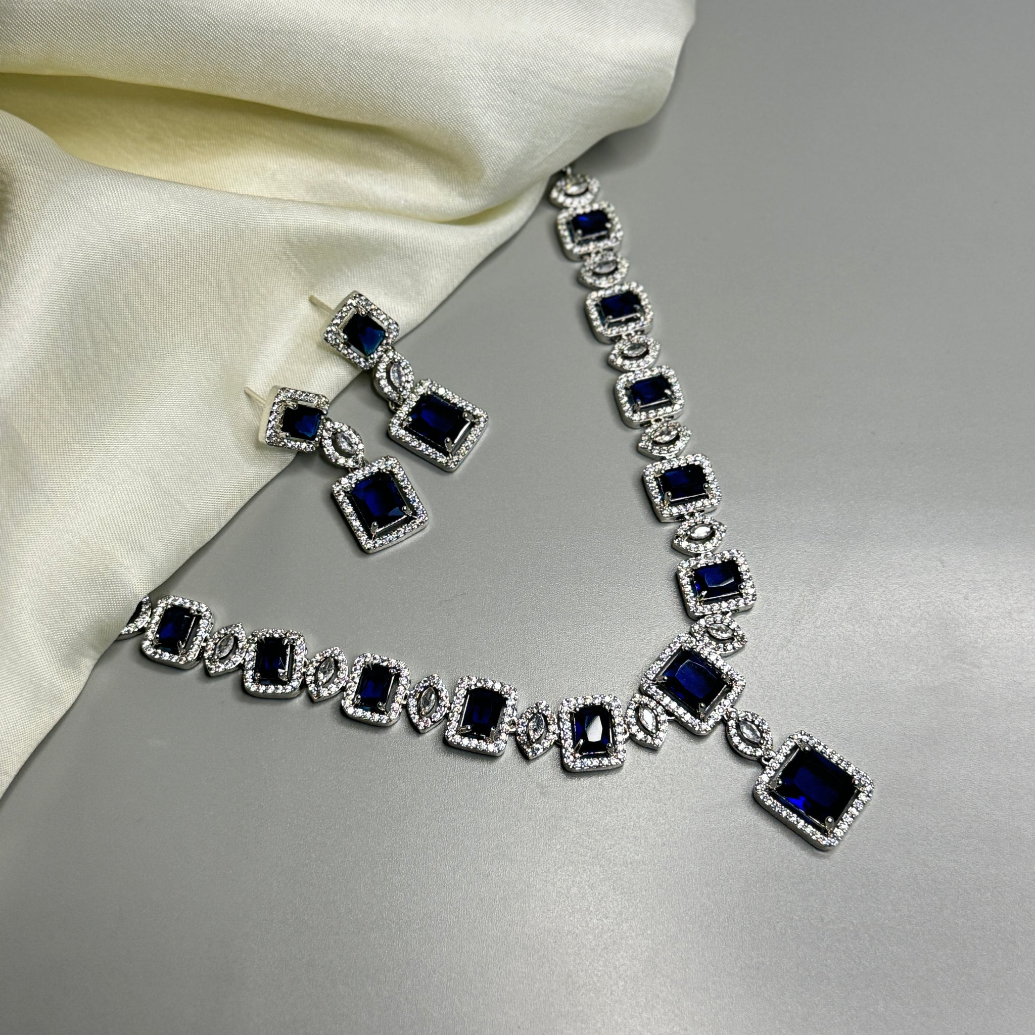 "Elegant AD Necklace with Blue Stones for a Royal Look"