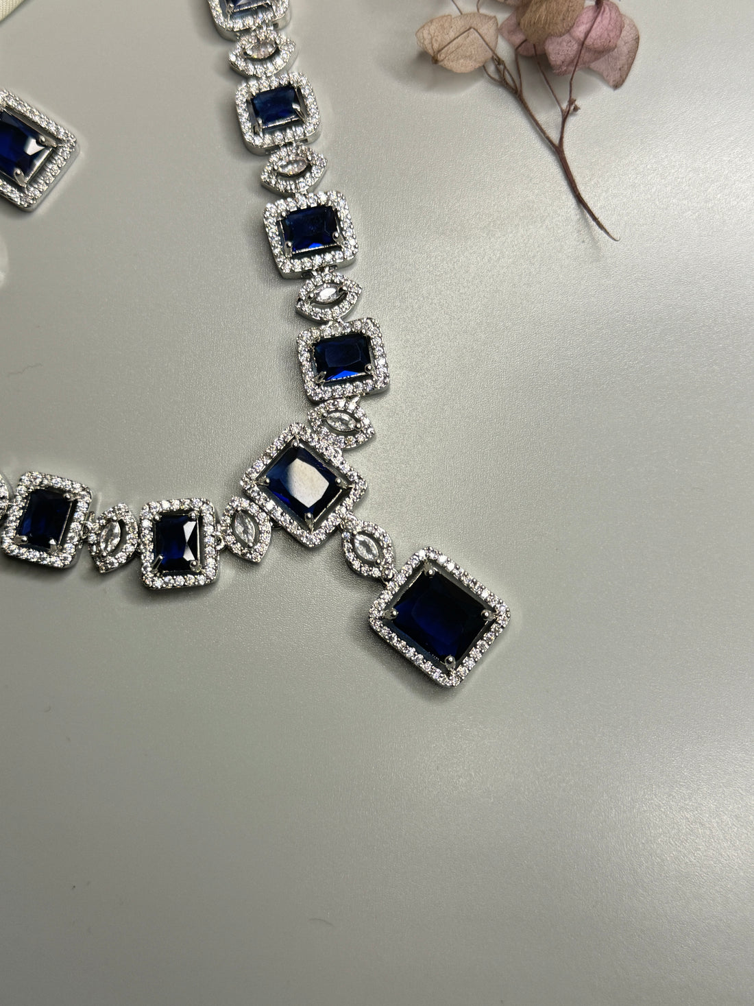 "Elegant AD Necklace with Blue Stones for a Royal Look"