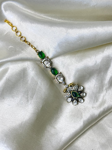 Graceful Peacock Maangtikka with Green Stones & Floral Accents