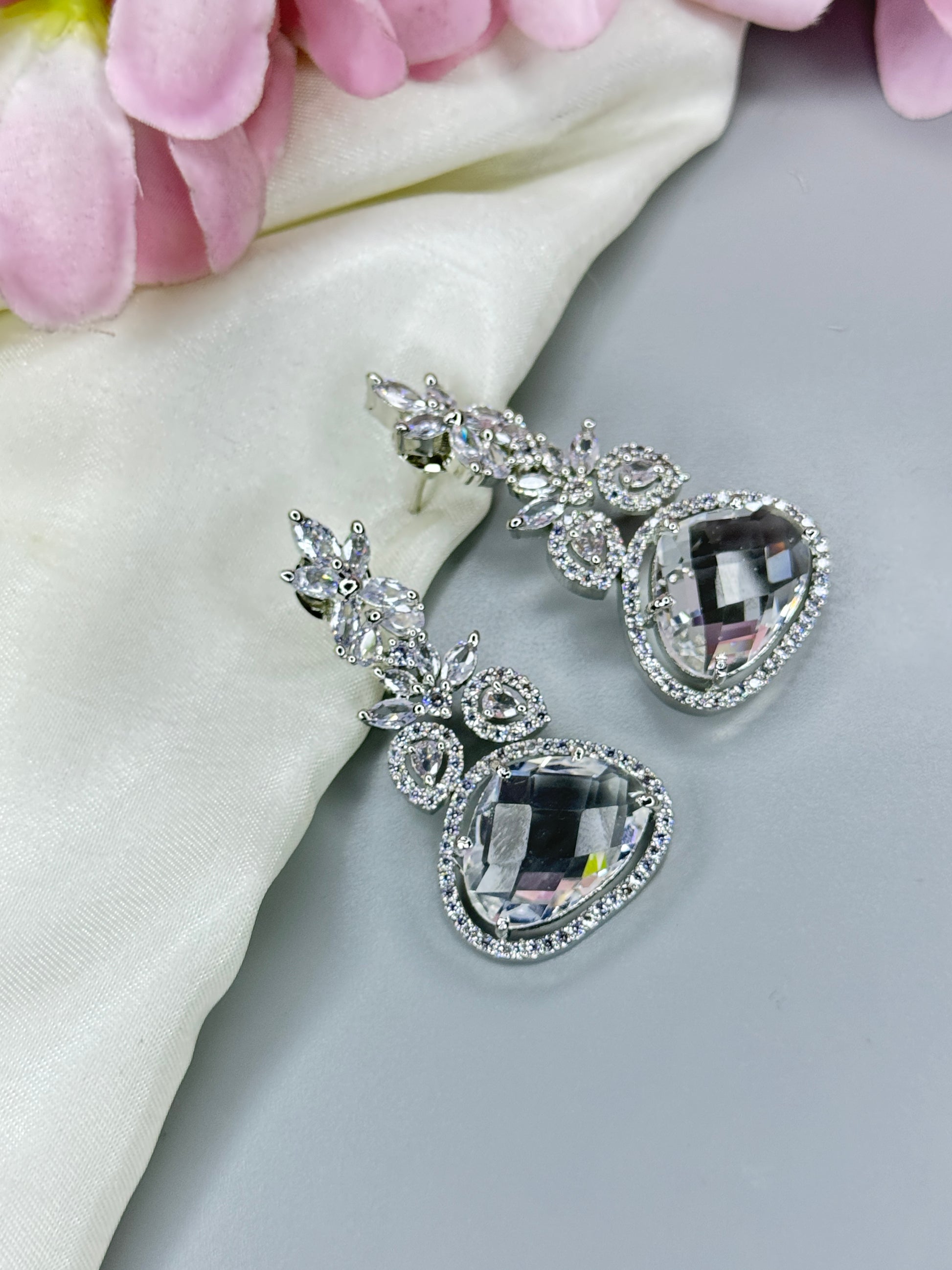 "Elegant AD Earrings with Dazzling Crystal Stones" - Jewels by Meena