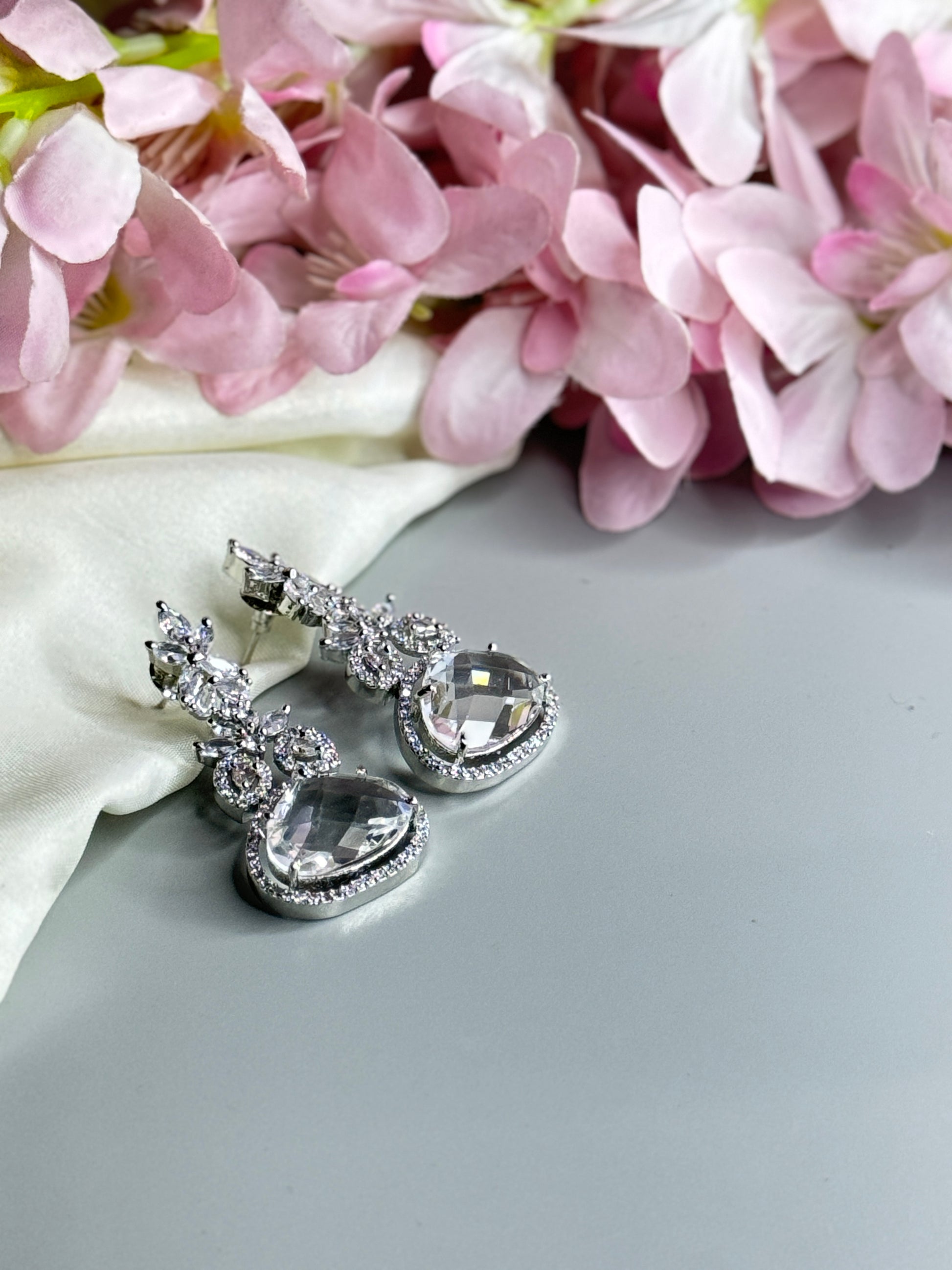 "Elegant AD Earrings with Dazzling Crystal Stones" - Jewels by Meena