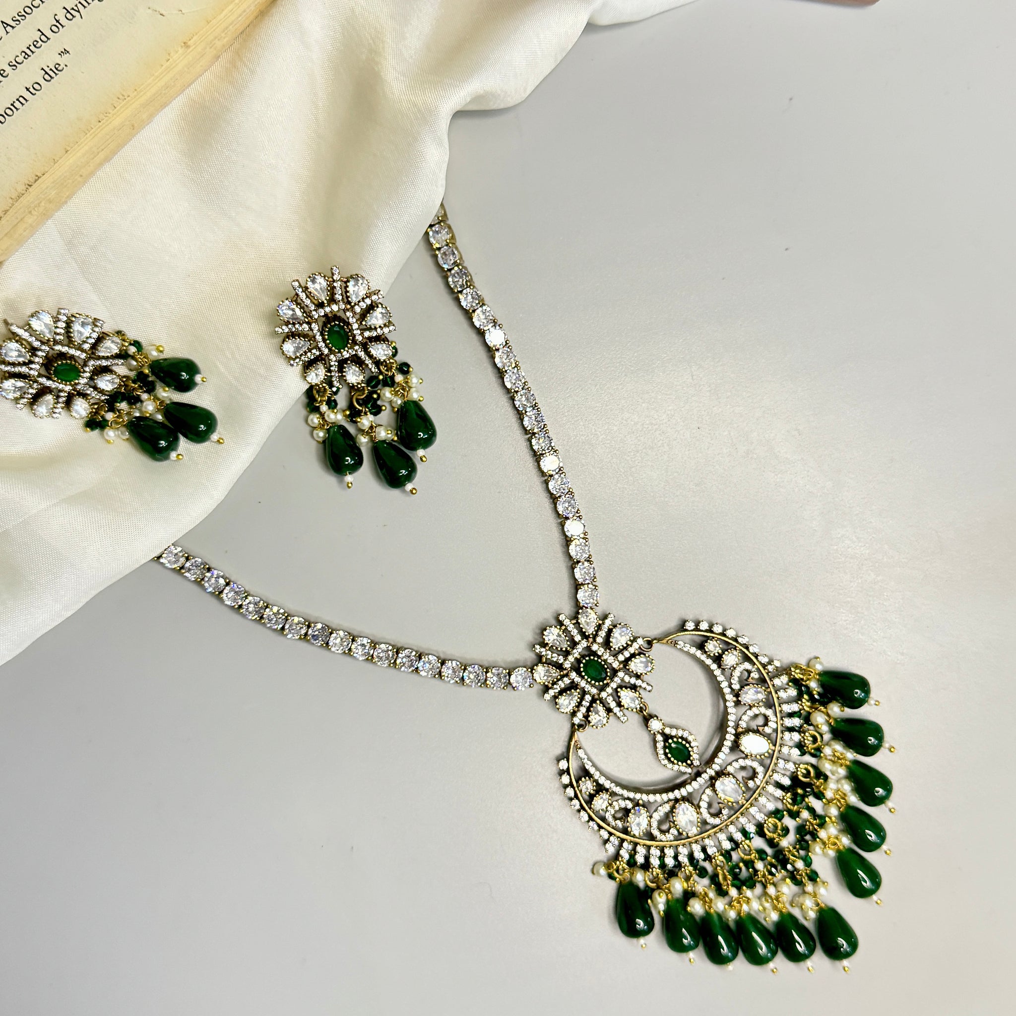 "Opulent Victorian Necklace with Green Beads and Gemstone Accent"