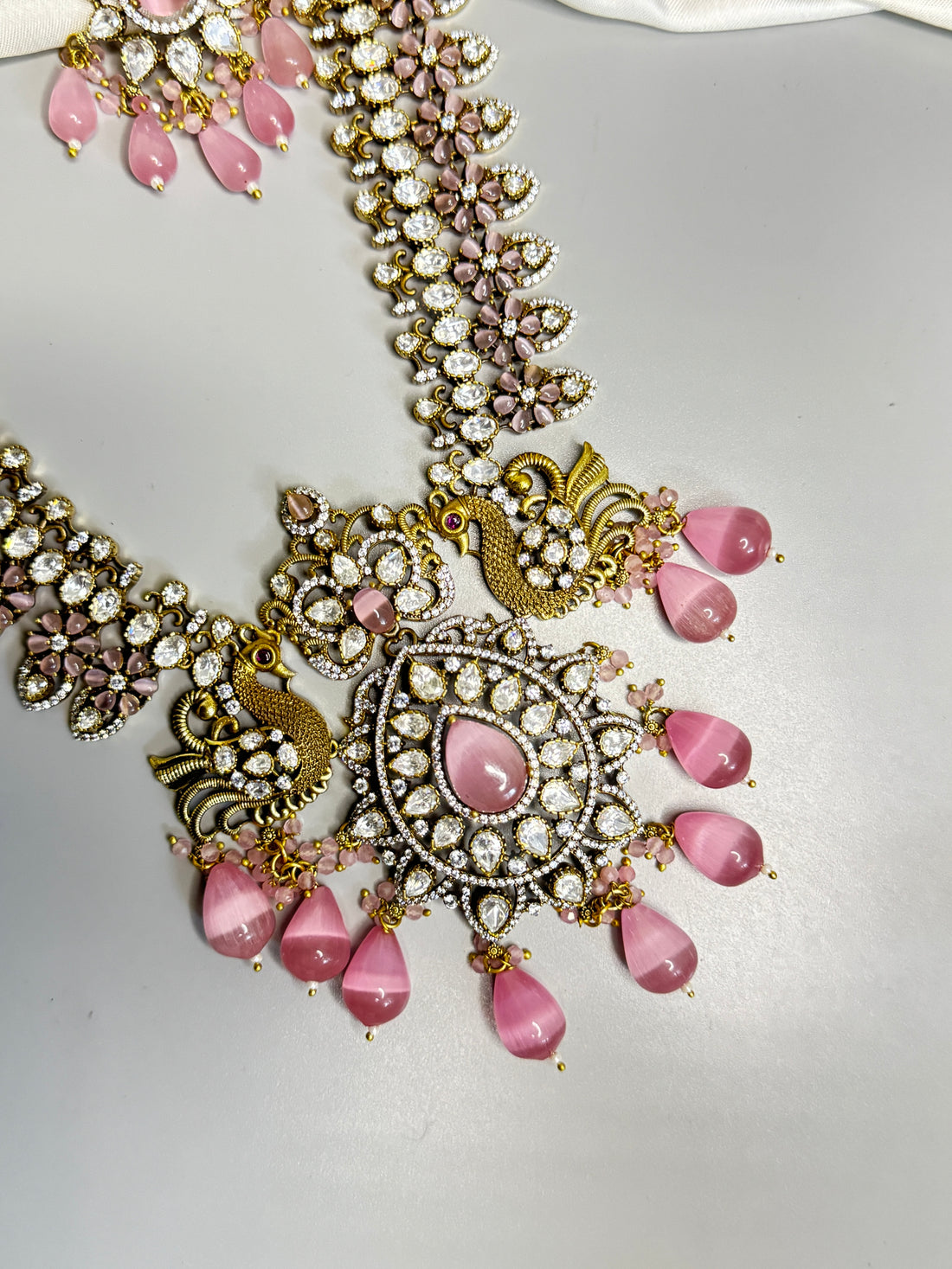 Radiant Victorian Necklace with Pink Beads and Peacock Motif