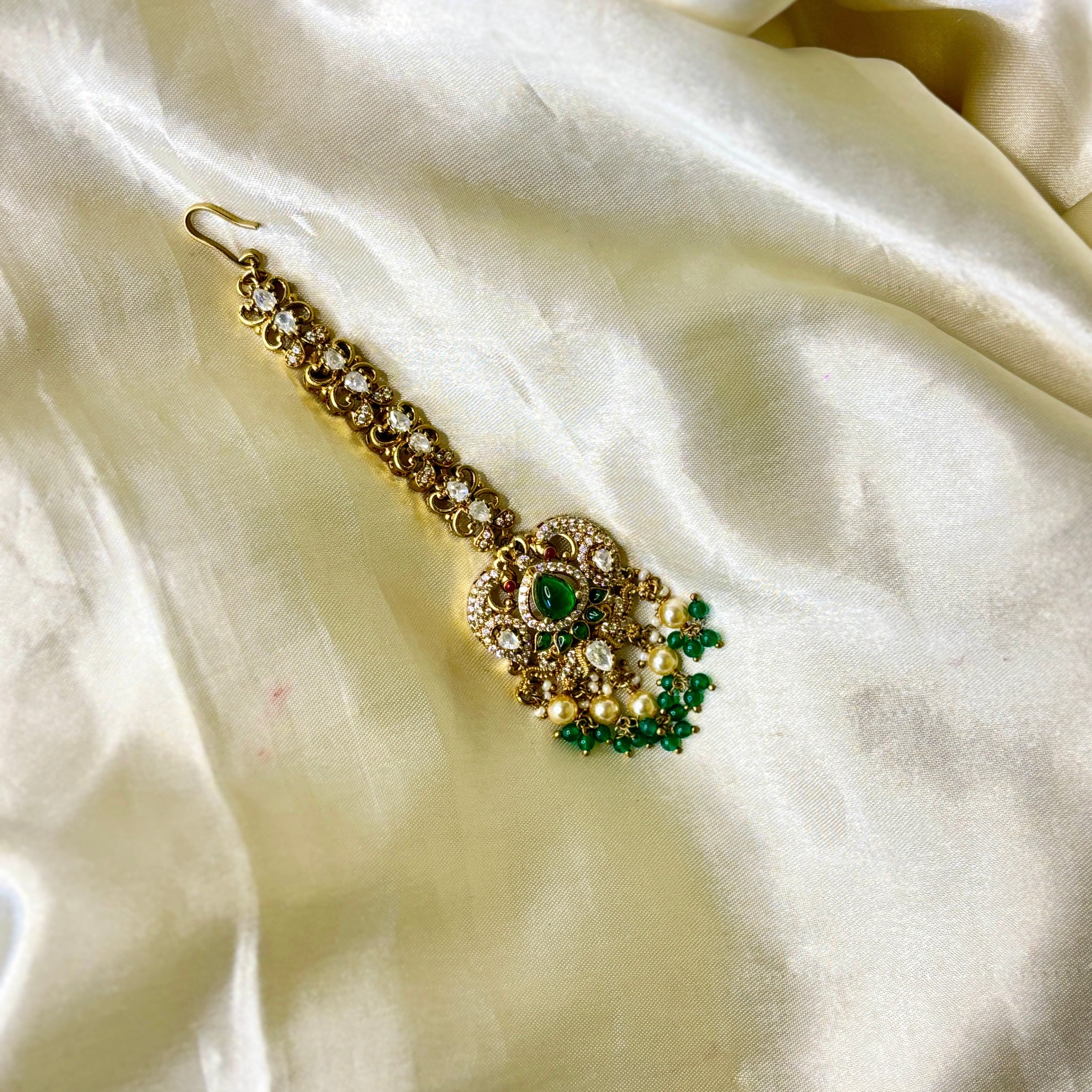 Elegant Victorian Peacock Maangtikka with Green Stone & Pearl Accents