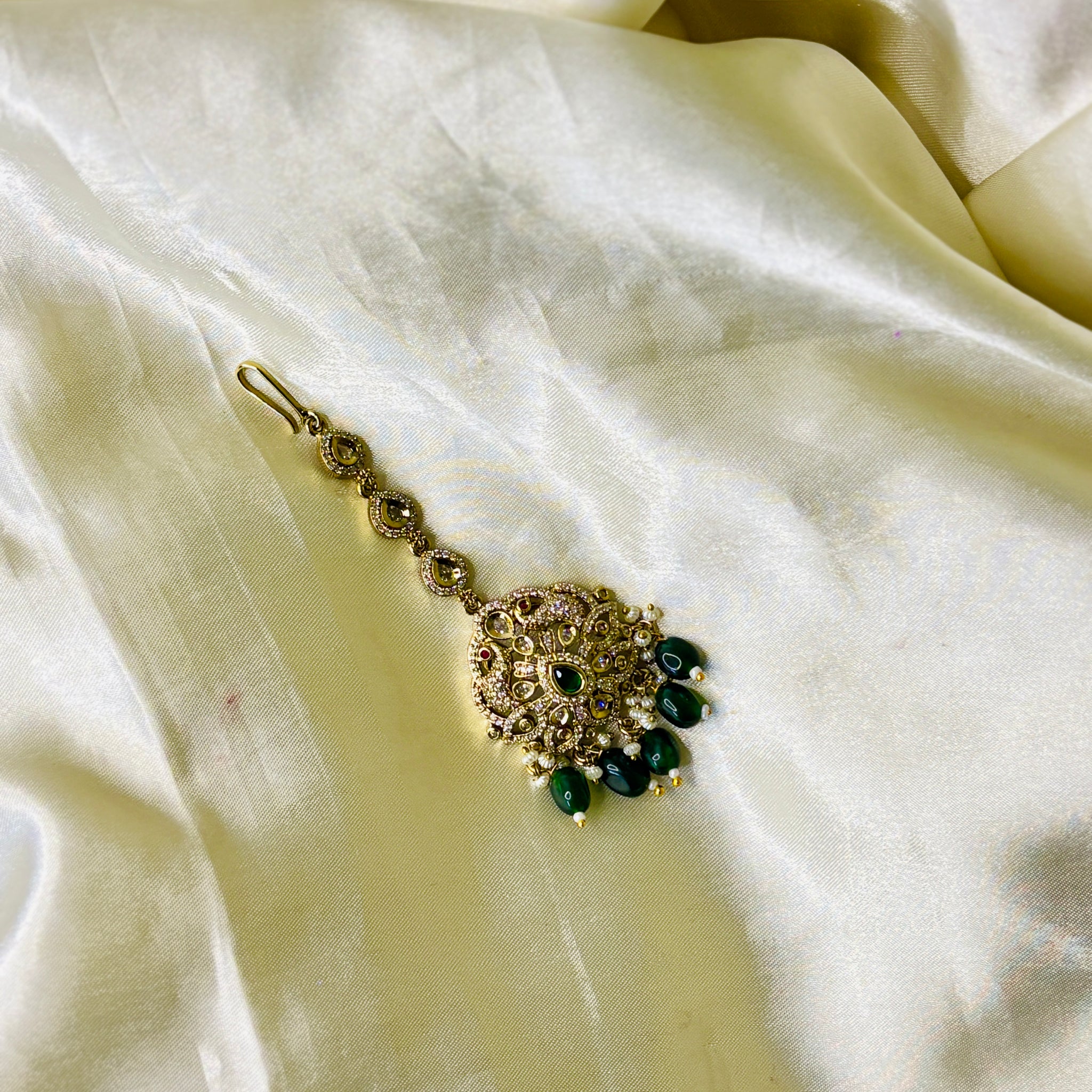 Graceful Peacock Maangtikka with Crystal Accents & Green Bead Droplets