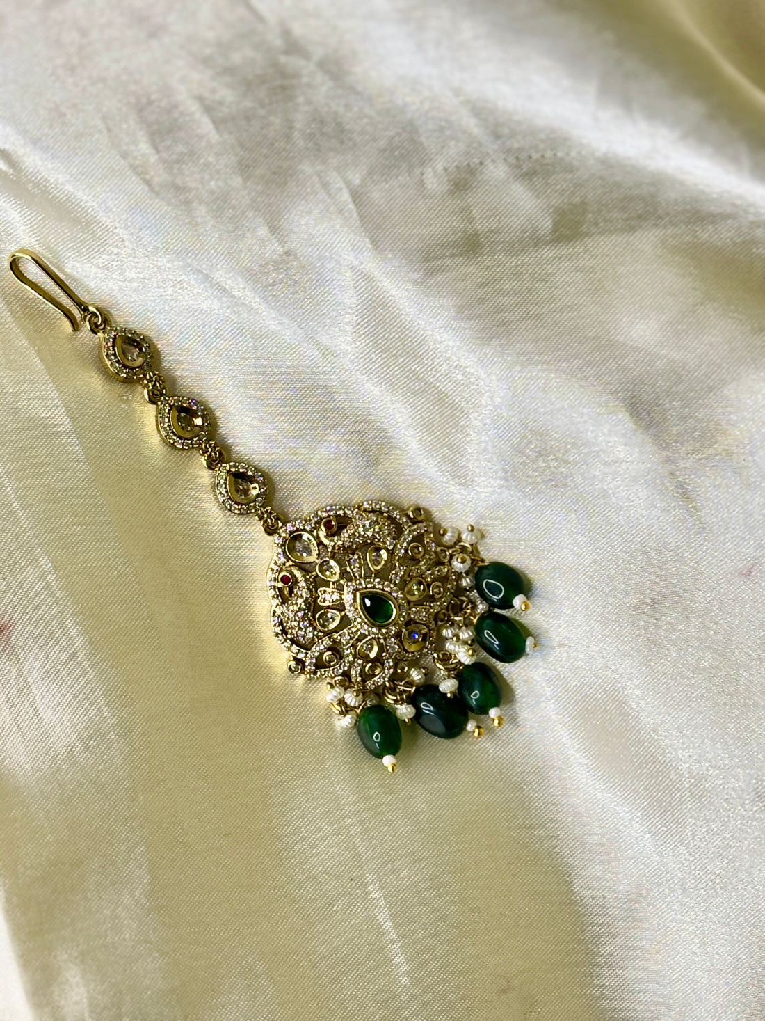 Graceful Peacock Maangtikka with Crystal Accents & Green Bead Droplets